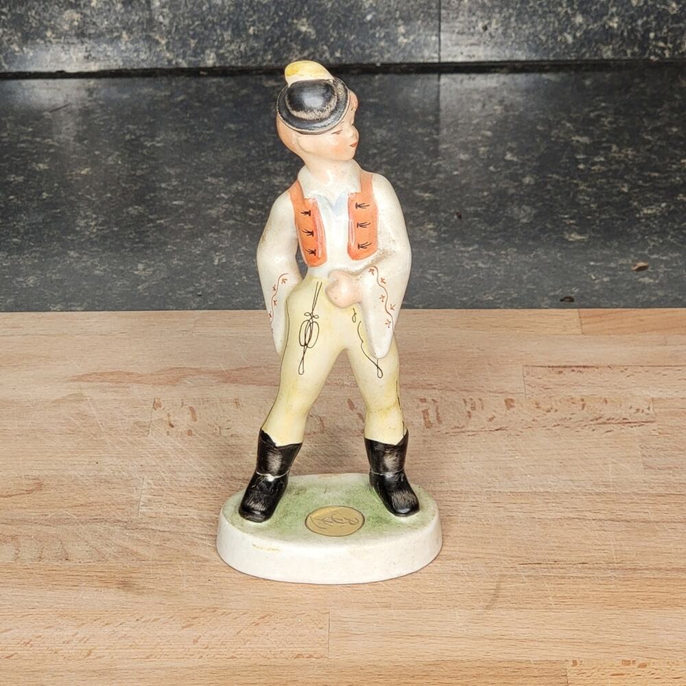 Porcelain Boy Figurine